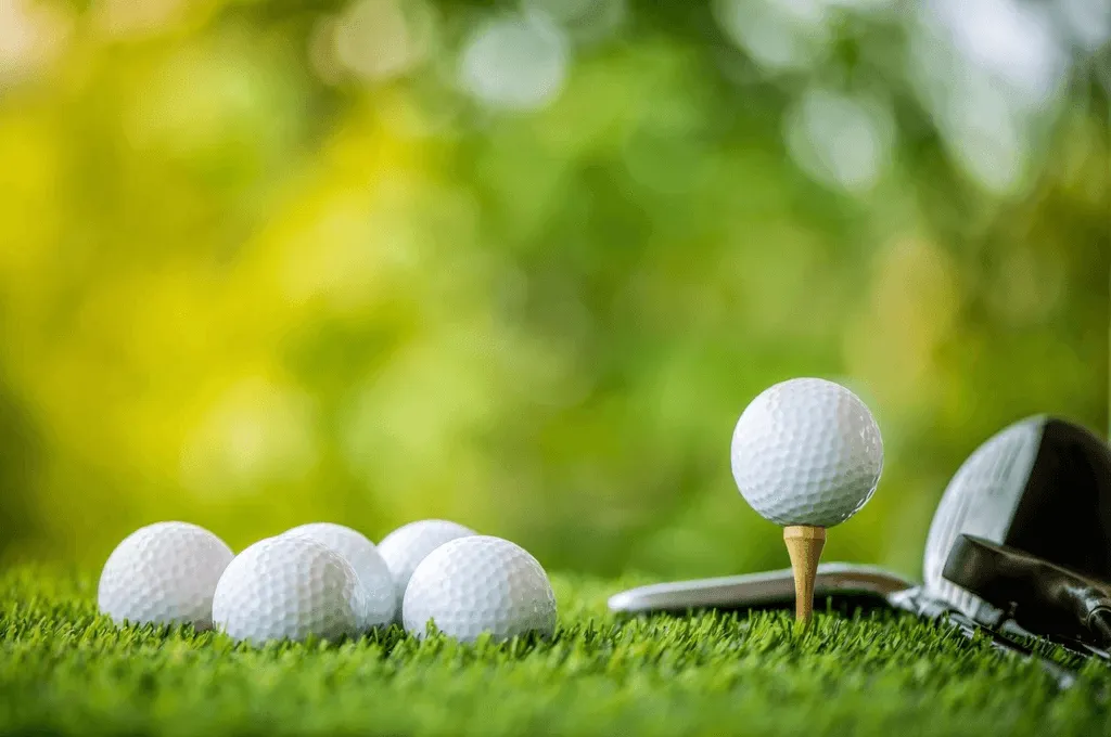 Golf balls on tees
